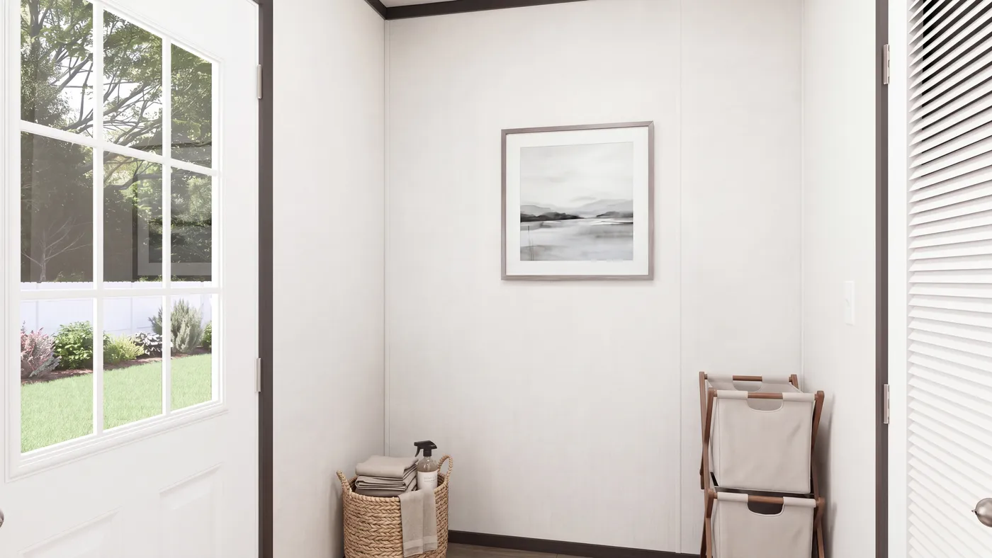 The THE MOUNTAINEER 56 Utility Room. This Manufactured Mobile Home features 3 bedrooms and 2 baths.