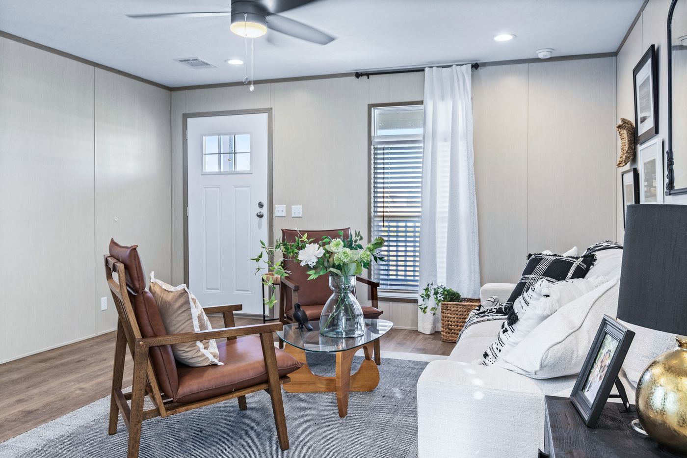 The PORCH LIVING SERIES 16682A Living Room. This Manufactured Mobile Home features 2 bedrooms and 2 baths.