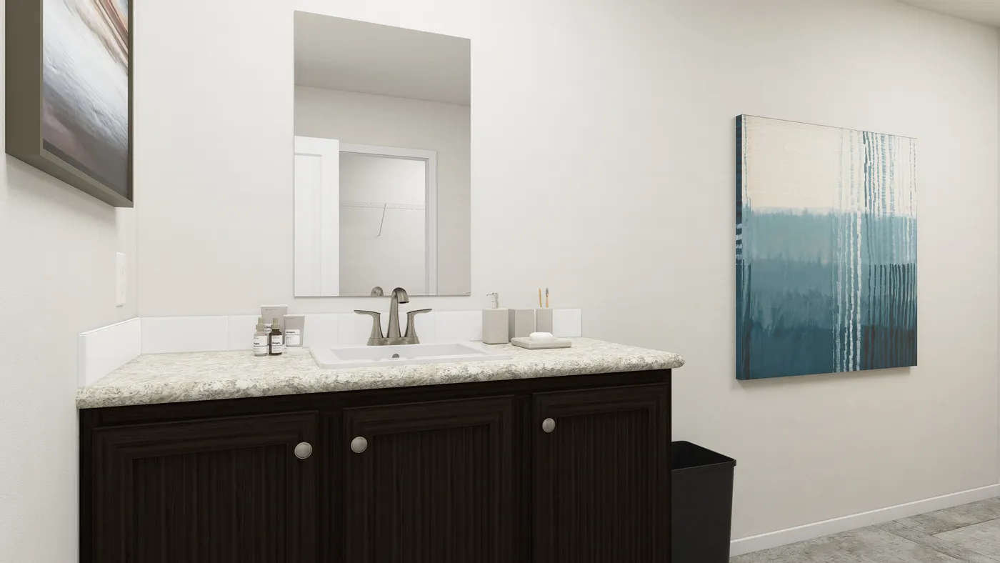 The SLE 561F Primary Bathroom. This Manufactured Mobile Home features 3 bedrooms and 2 baths.
