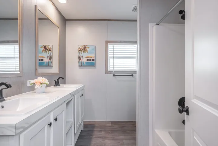 The BLUEBONNET BREEZE Guest Bathroom. This Manufactured Mobile Home features 3 bedrooms and 2 baths.