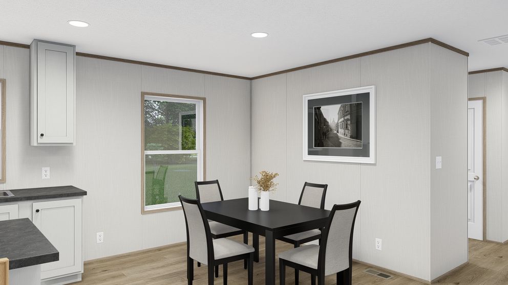 The ASPIRE Dining Area. This Manufactured Mobile Home features 3 bedrooms and 2 baths.