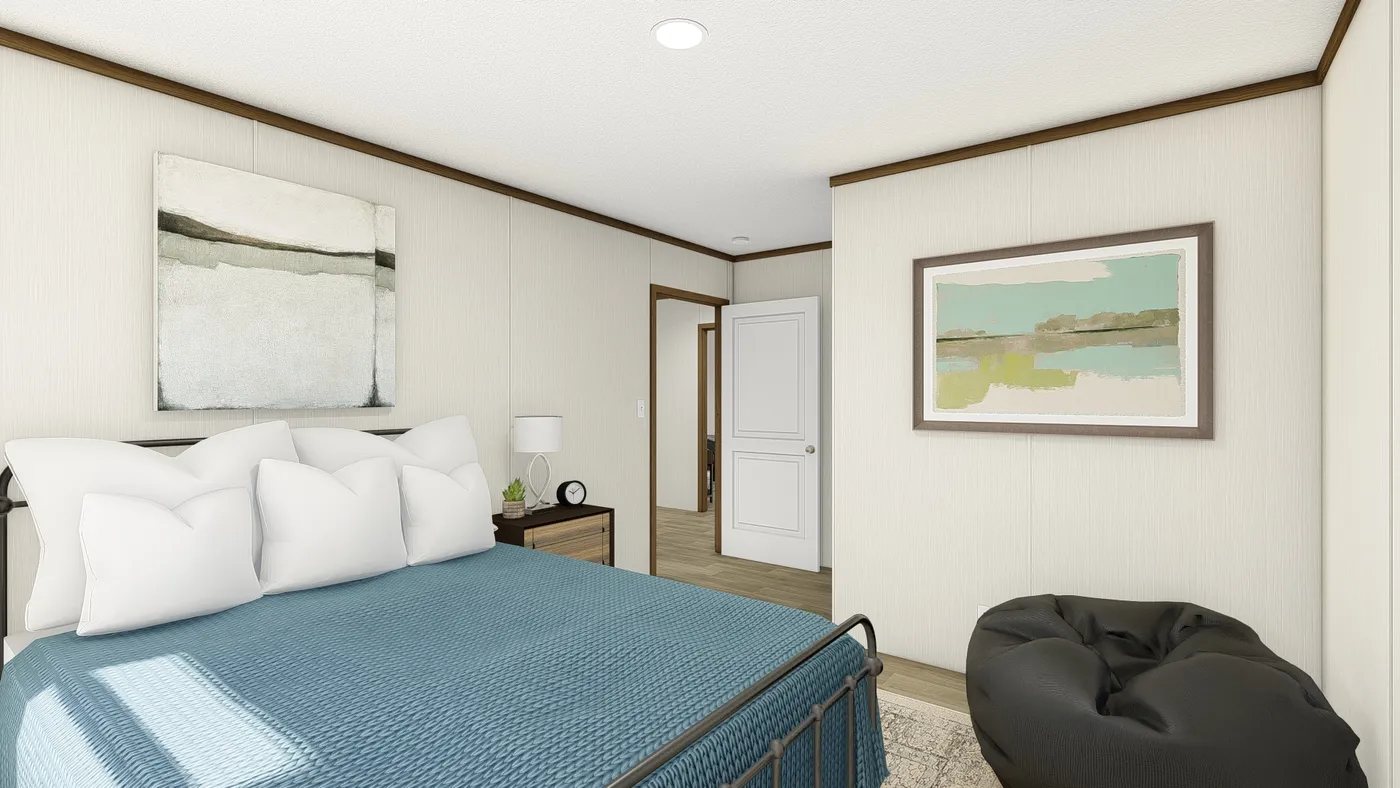 The THE EMPOWER Guest Bedroom. This Manufactured Mobile Home features 4 bedrooms and 2 baths.