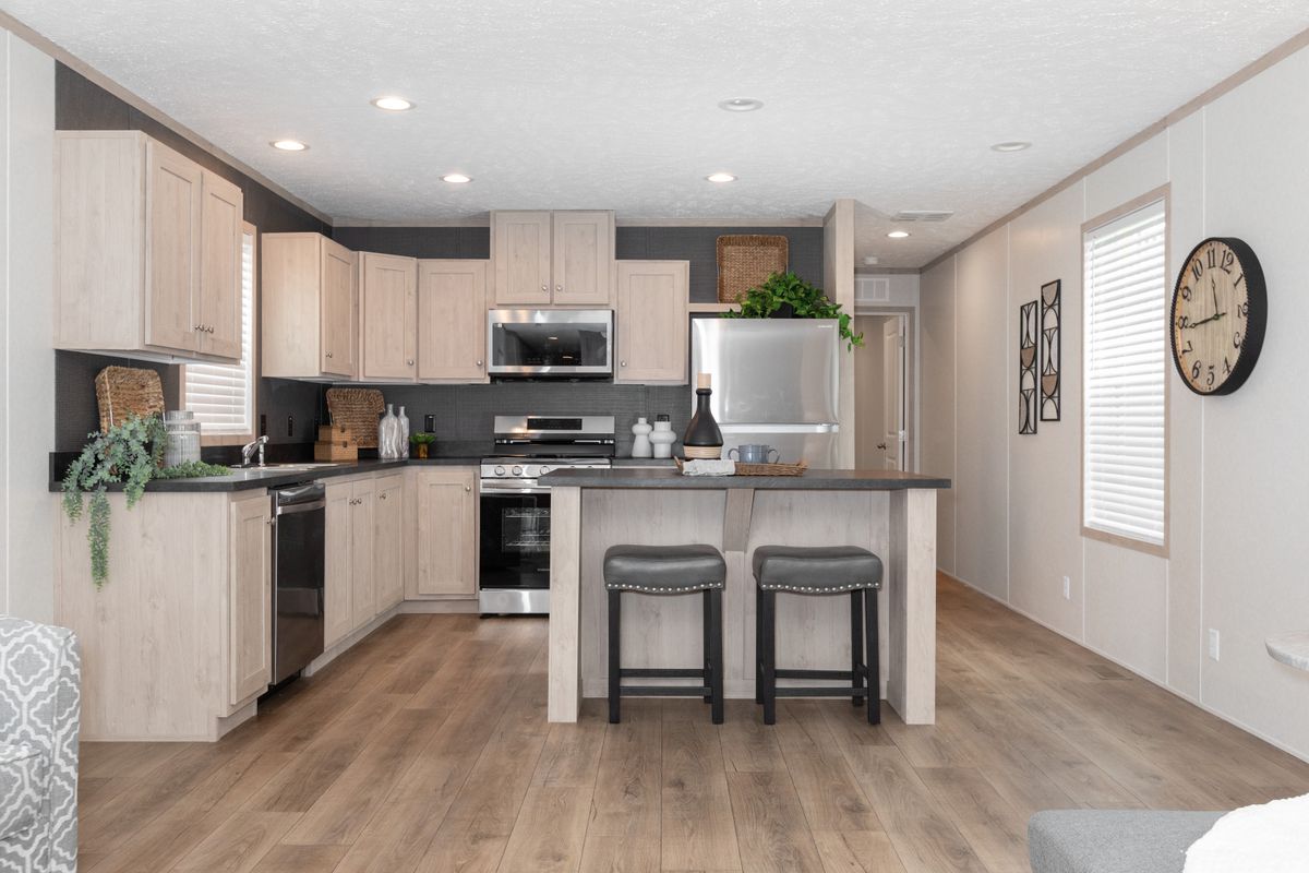 The 7616-4200 ADRENALINE Kitchen. This Manufactured Mobile Home features 3 bedrooms and 2 baths.