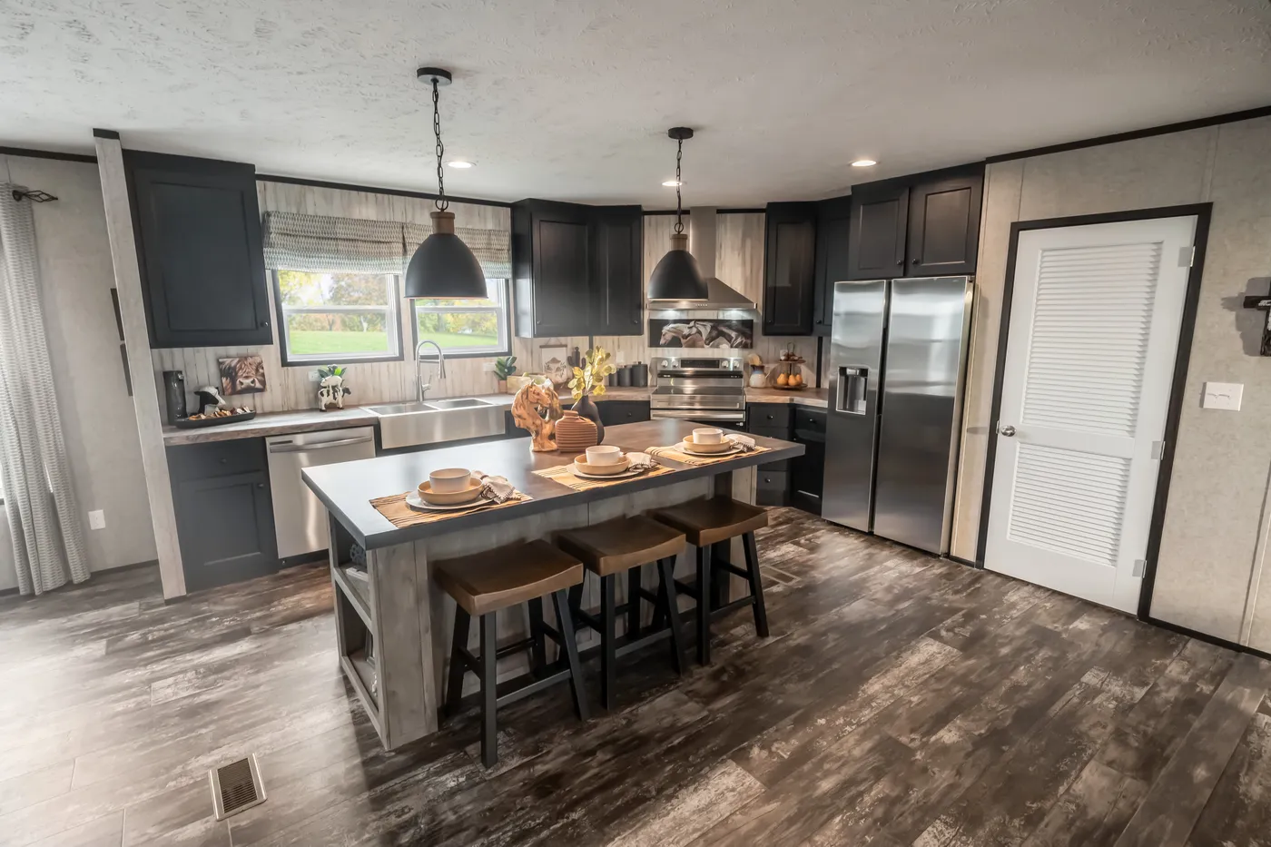 The THE TRIBUTARY Exterior. This Manufactured Mobile Home features 3 bedrooms and 2 baths.