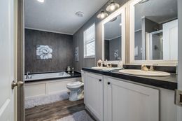 The TRADITION 48 Primary Bathroom. This Manufactured Mobile Home features 3 bedrooms and 2 baths.