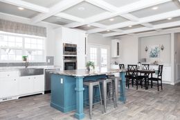 The SUPER 68 ELITE Kitchen. This Manufactured Mobile Home features 3 bedrooms and 2 baths.