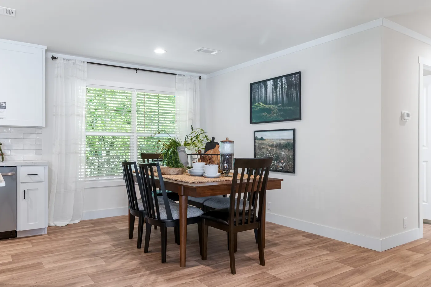 The FARM 4 FLEX ELITE Dining Room. This Manufactured Mobile Home features 4 bedrooms and 3 baths.