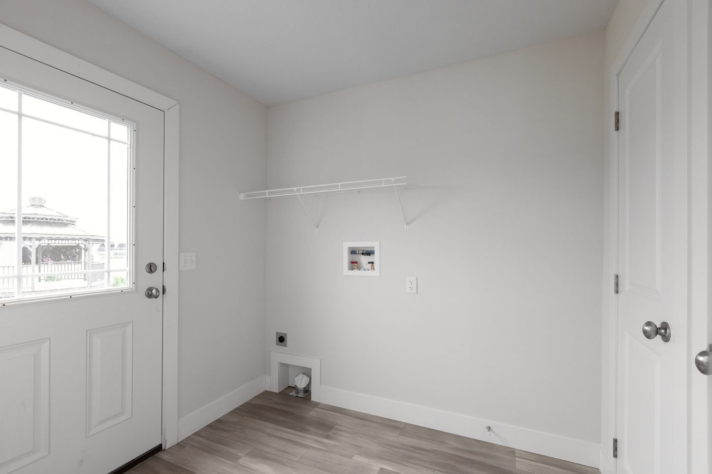 The HILL ST/5628-MS020-1 SECT Utility Room. This Manufactured Mobile Home features 3 bedrooms and 2 baths.