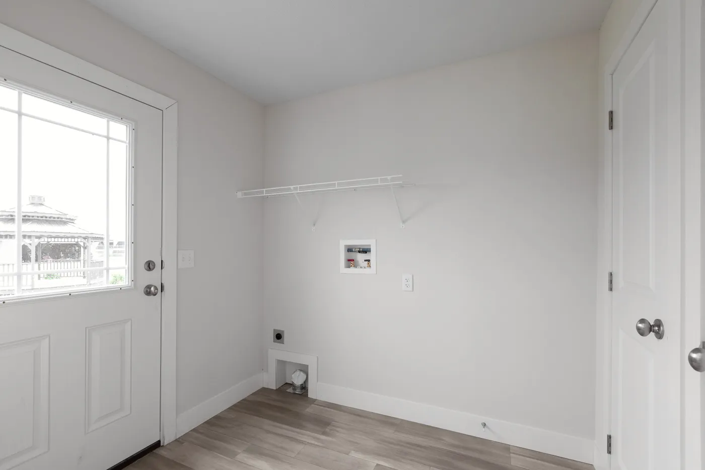 The HILL ST/5628-MS020-1 SECT Utility Room. This Manufactured Mobile Home features 3 bedrooms and 2 baths.