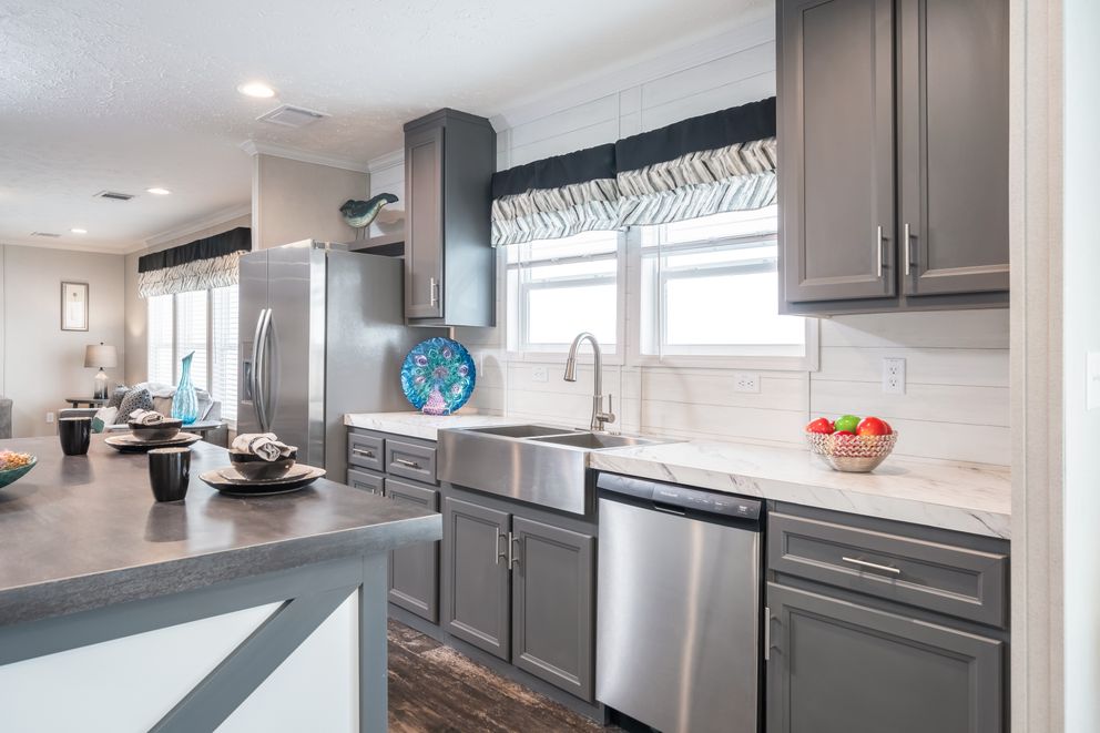 The ALL AMERICAN Kitchen. This Manufactured Mobile Home features 3 bedrooms and 2 baths.