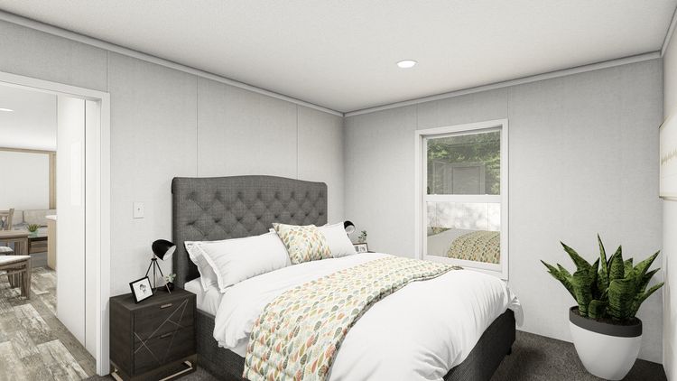 The TOPAZ Primary Bedroom. This Manufactured Mobile Home features 3 bedrooms and 2 baths.
