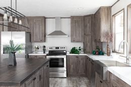 The LEWIS Kitchen. This Manufactured Mobile Home features 3 bedrooms and 2 baths.