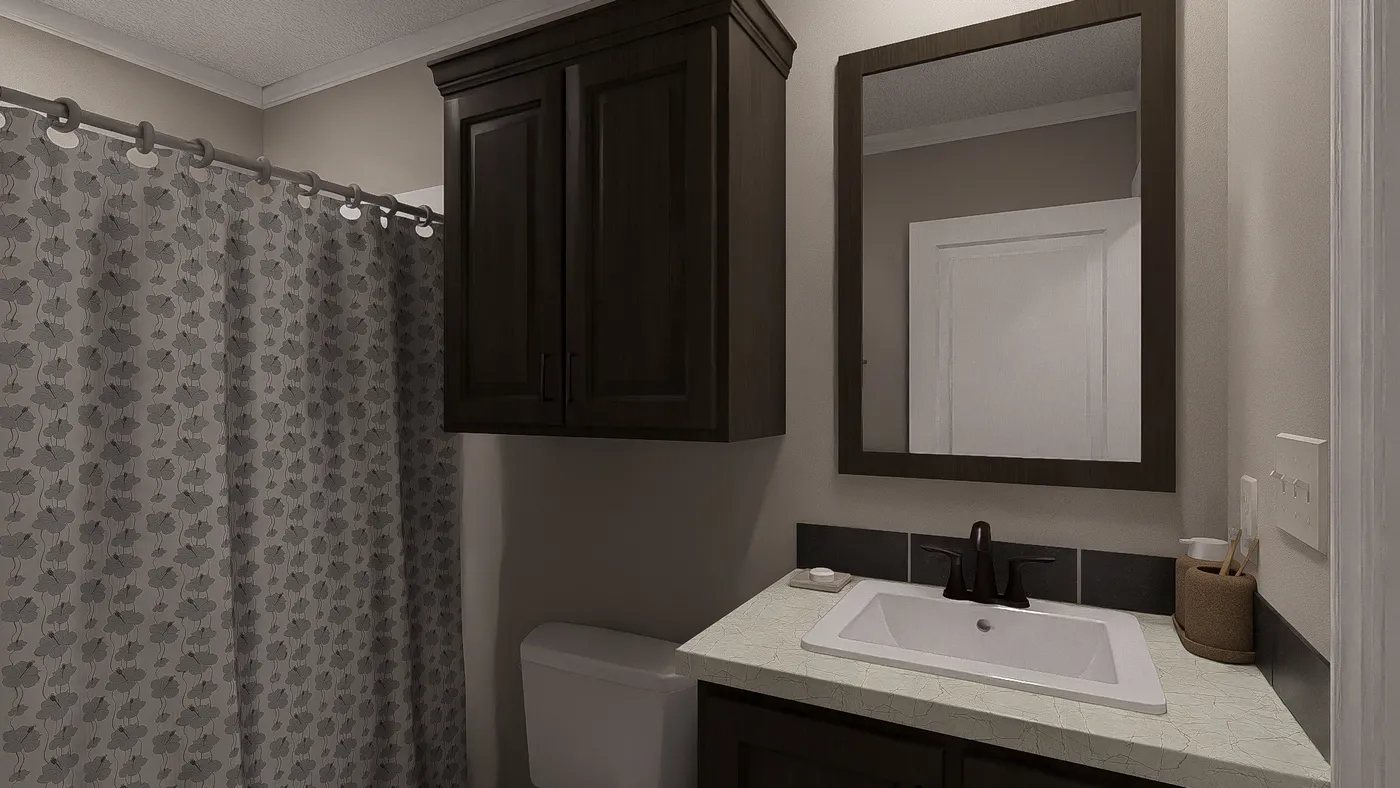 The THE LIL' EASY Guest Bathroom. This Manufactured Mobile Home features 3 bedrooms and 2 baths.