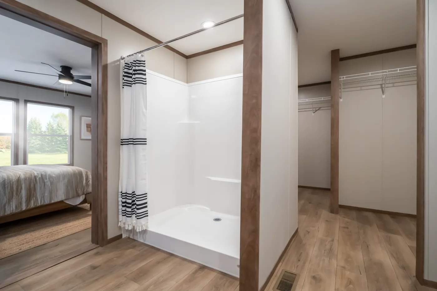 The SEVIER Primary Bathroom. This Manufactured Mobile Home features 4 bedrooms and 3 baths.