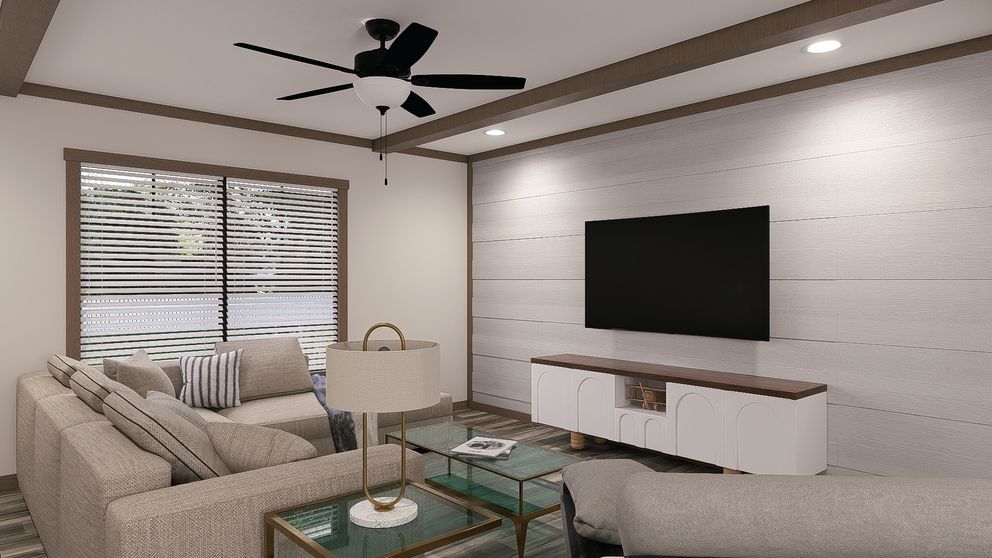 The SAWYER ELITE Living Room. This Manufactured Mobile Home features 3 bedrooms and 2 baths.