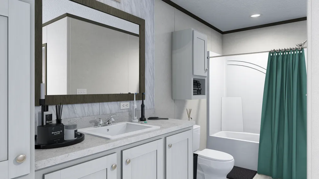 The 5228-E785 THE PULSE Primary Bathroom. This Manufactured Mobile Home features 3 bedrooms and 2 baths.