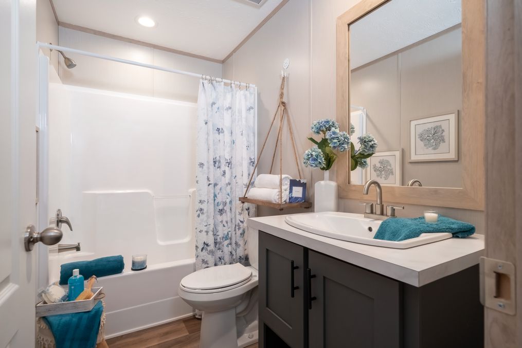 The DESOTO Guest Bathroom. This Manufactured Mobile Home features 3 bedrooms and 2 baths.