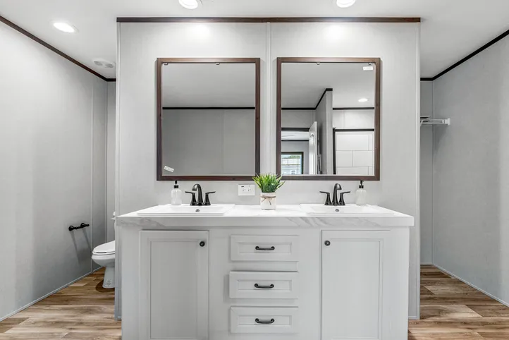 The THE ANNIVERSARY 2.1 Primary Bathroom. This Manufactured Mobile Home features 3 bedrooms and 2 baths.