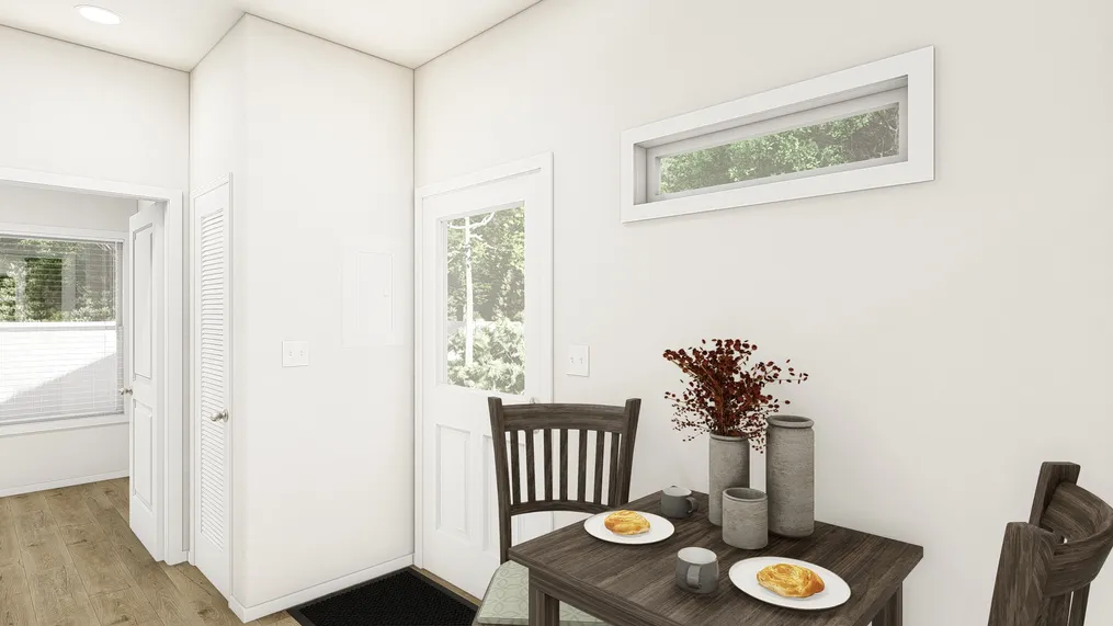 The CASITA 30-1M+8'PORCH     DREAM Dining Area. This Manufactured Mobile Home features 1 bedroom and 1 bath.