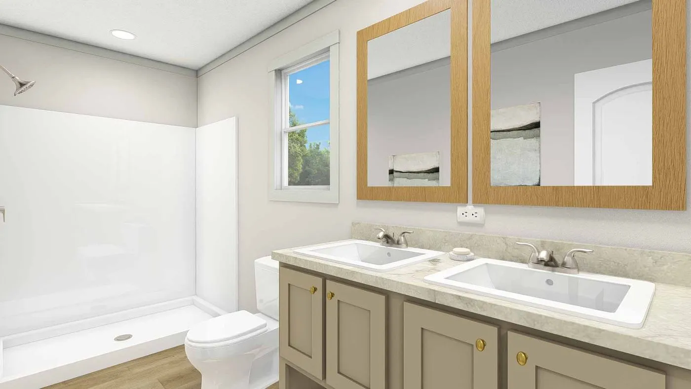 The BEAUTIFUL MORNING Primary Bathroom. This Manufactured Mobile Home features 3 bedrooms and 2 baths.