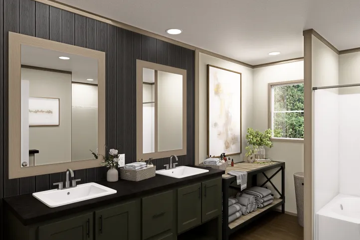 The RAINIER Primary Bathroom. This Manufactured Mobile Home features 4 bedrooms and 3 baths.