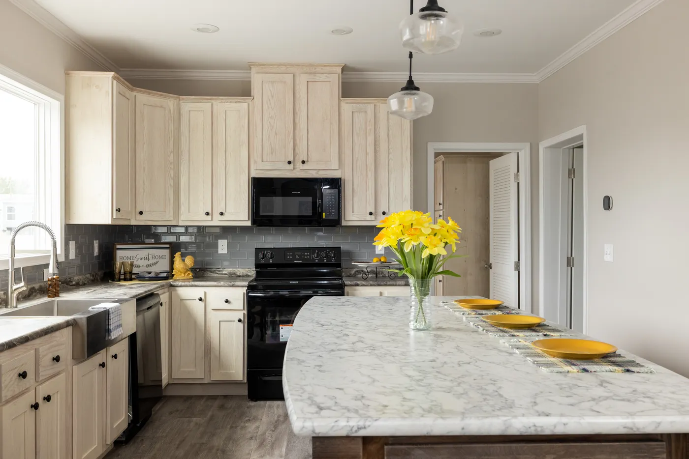 The THE ROGUE Kitchen. This Manufactured Mobile Home features 3 bedrooms and 2 baths.
