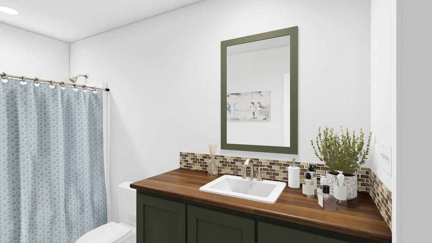 The DRM386A 2438'            DREAM Primary Bathroom. This Manufactured Mobile Home features 2 bedrooms and 2 baths.