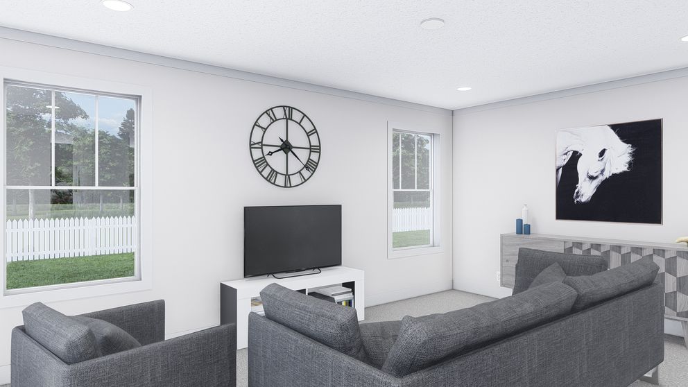 The JOHNNY B GOODE Living Room. This Manufactured Mobile Home features 3 bedrooms and 2 baths.
