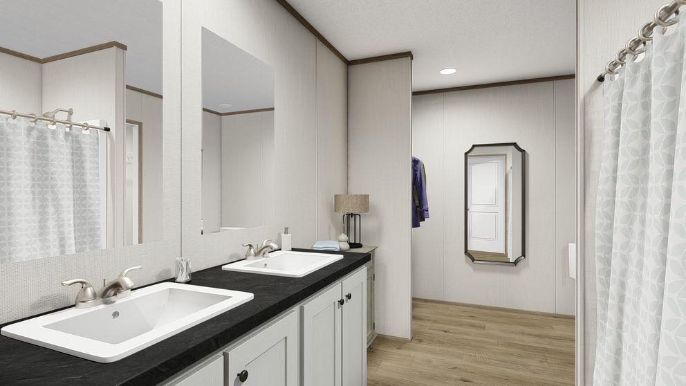 The HAVEN Primary Bathroom. This Manufactured Mobile Home features 3 bedrooms and 2 baths.