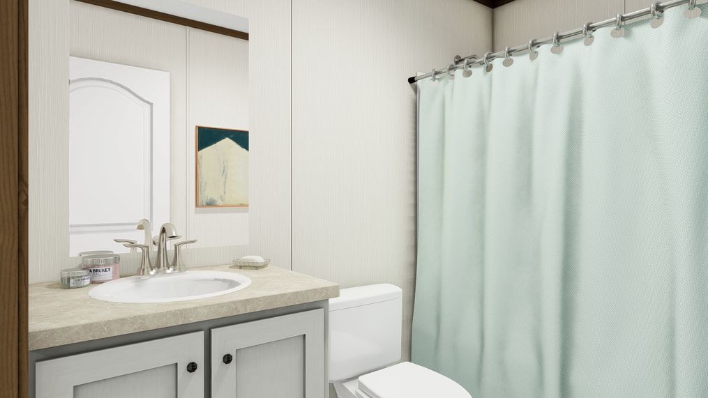 The COLOSSAL Guest Bathroom. This Manufactured Mobile Home features 3 bedrooms and 2 baths.