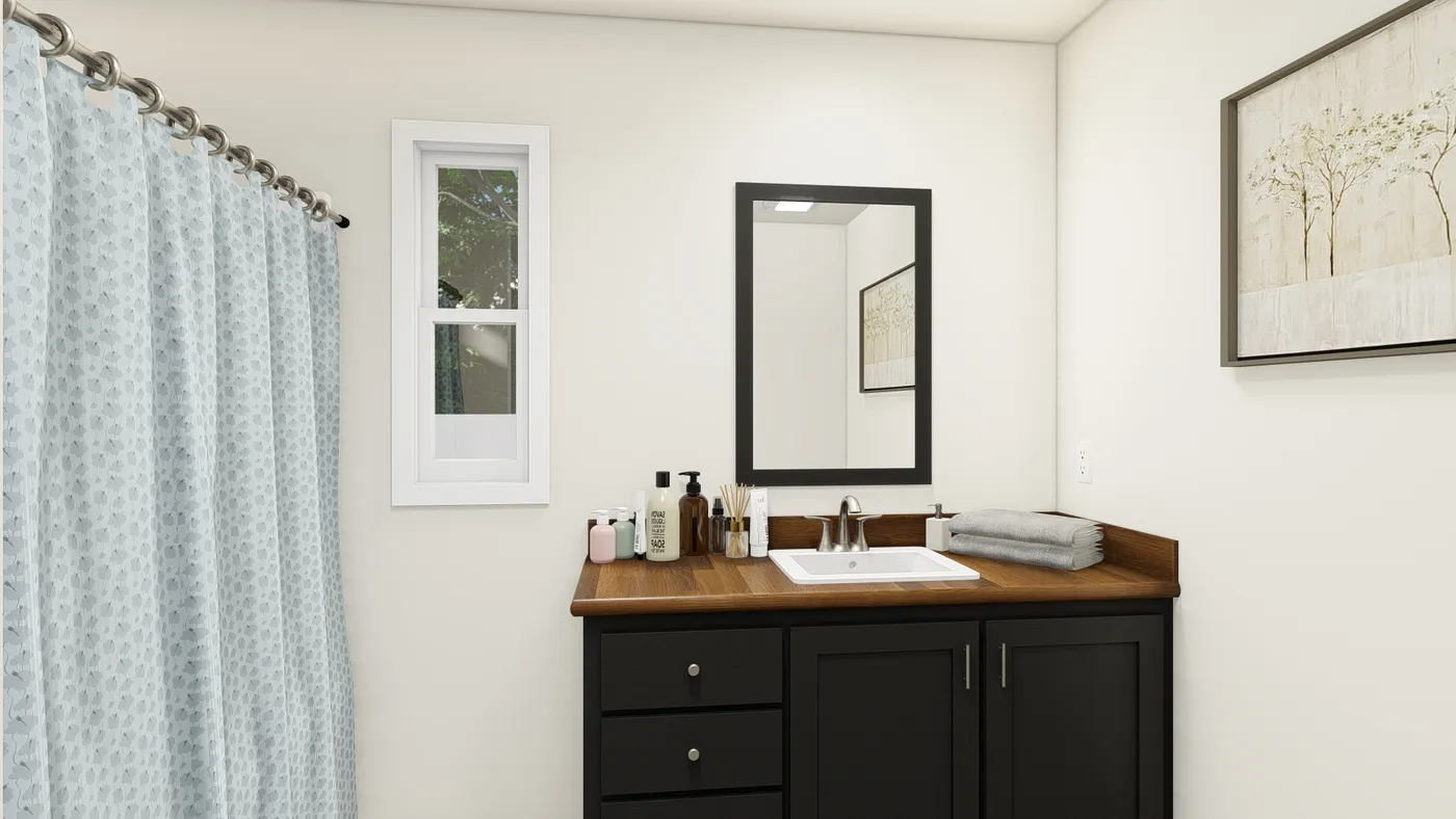 The DRM483F 48'              DREAM Primary Bathroom. This Manufactured Mobile Home features 3 bedrooms and 2 baths.