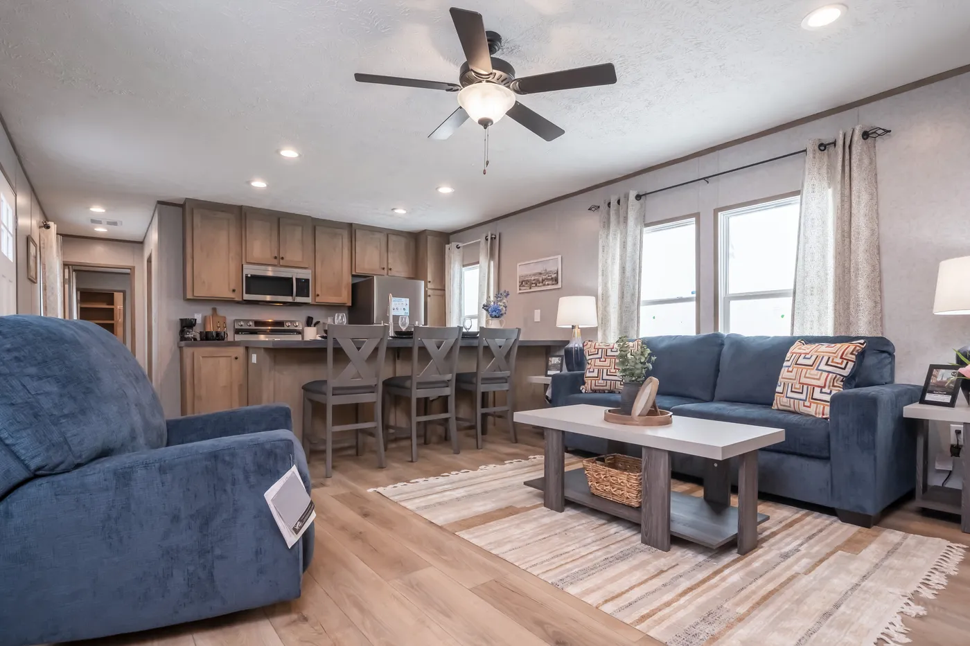 The WARRIOR II Living Room. This Manufactured Mobile Home features 2 bedrooms and 2 baths.