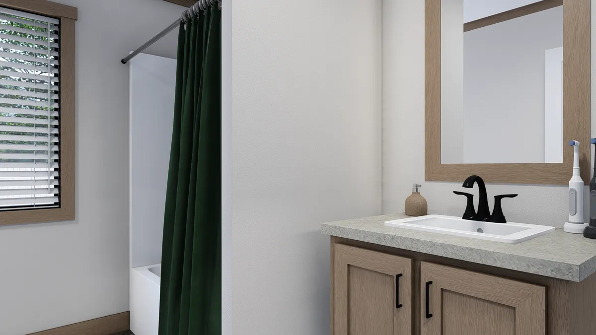 The EMILIE Guest Bathroom. This Manufactured Mobile Home features 3 bedrooms and 2 baths.