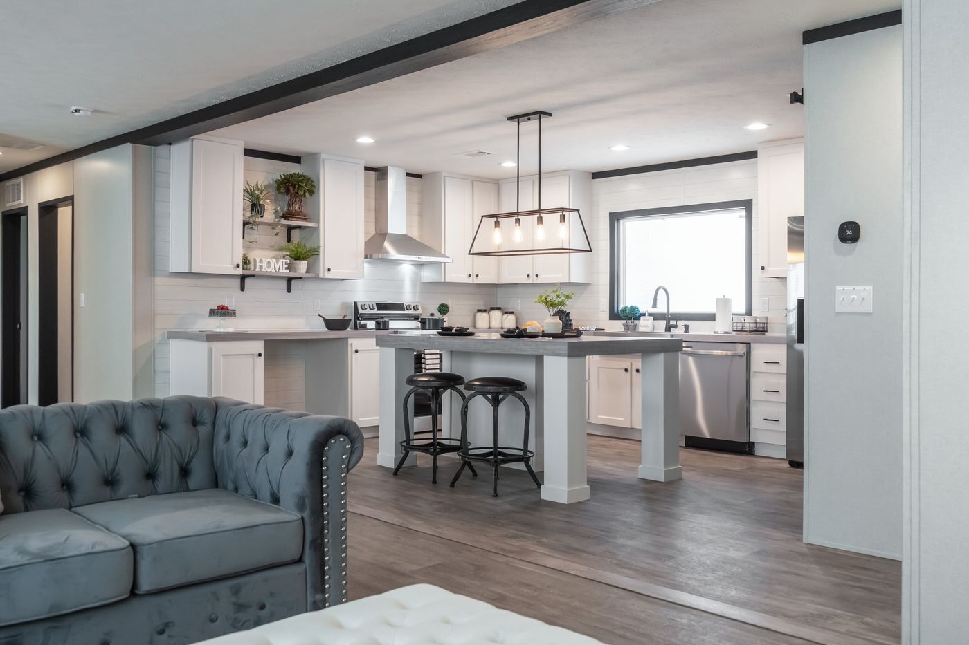 The BREEZE FARMHOUSE Kitchen. This Manufactured Mobile Home features 3 bedrooms and 2 baths.