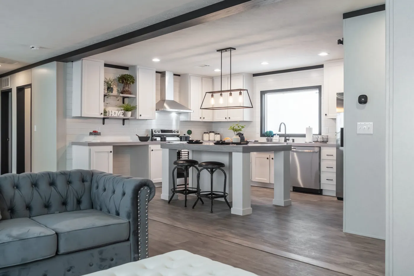 The BREEZE FARMHOUSE Kitchen. This Manufactured Mobile Home features 3 bedrooms and 2 baths.
