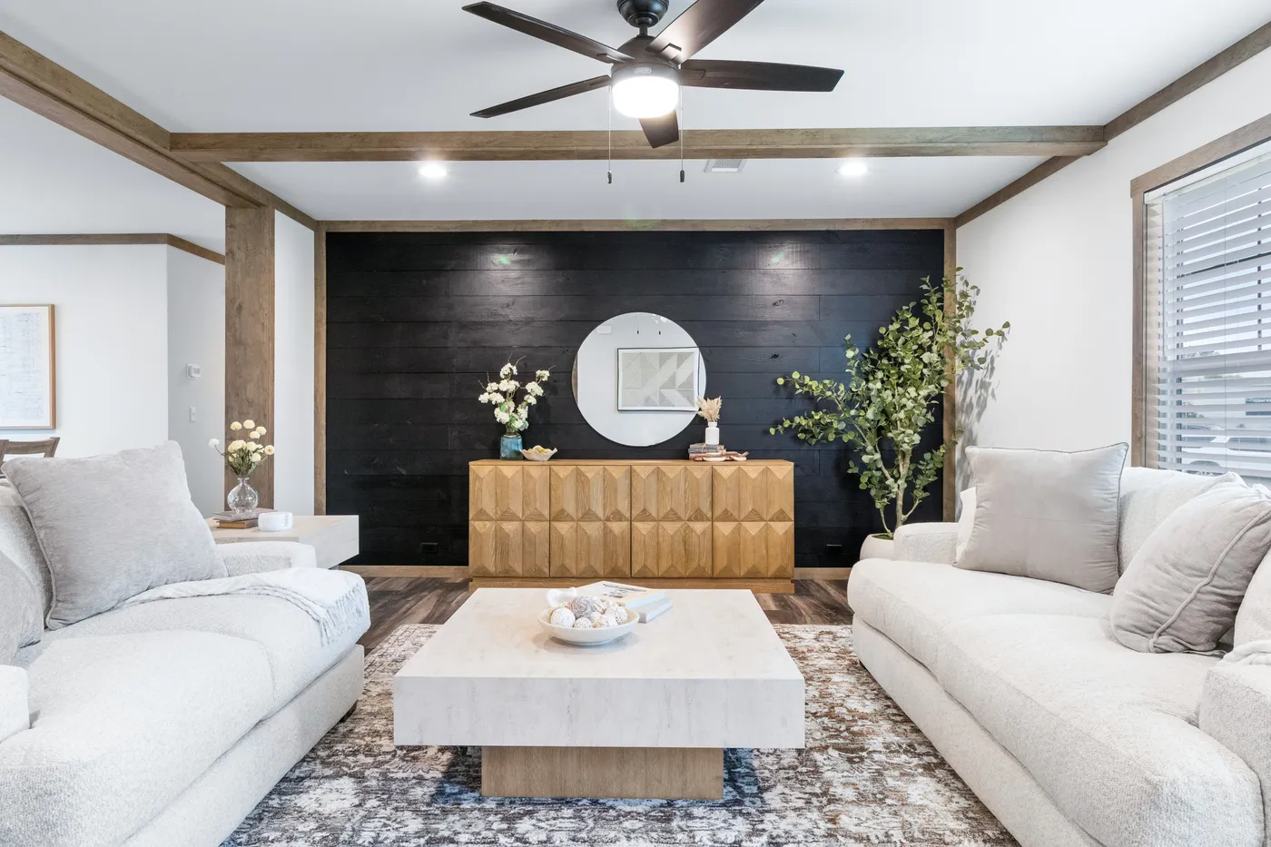 The EVERETT ELITE Living Room. This Manufactured Mobile Home features 4 bedrooms and 3 baths.