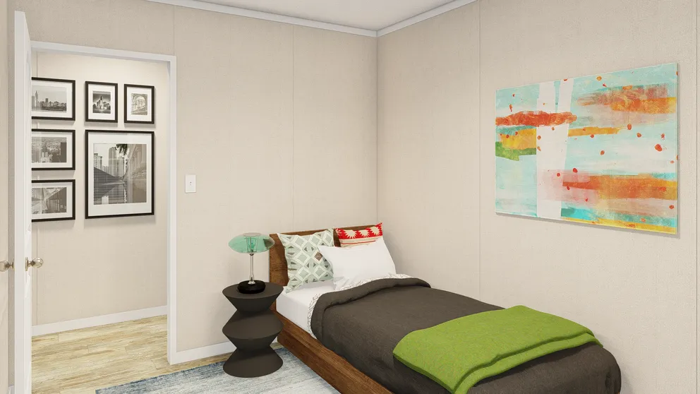 The GRAND LIVING 76B Bedroom. This Manufactured Mobile Home features 3 bedrooms and 2 baths.