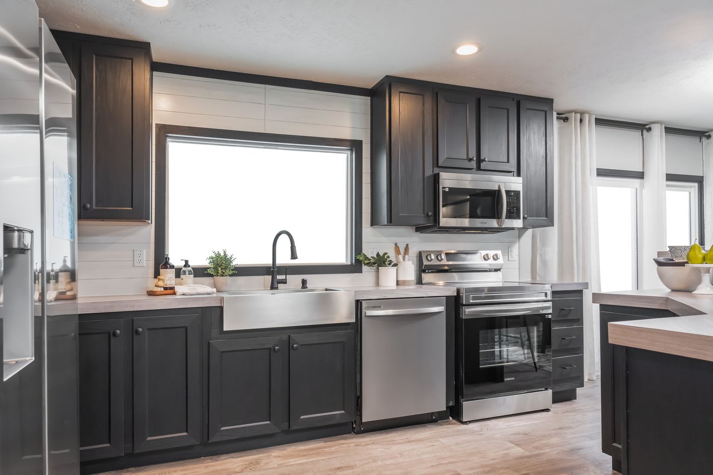 The CRAZY EIGHTS Kitchen. This Manufactured Mobile Home features 4 bedrooms and 2 baths.