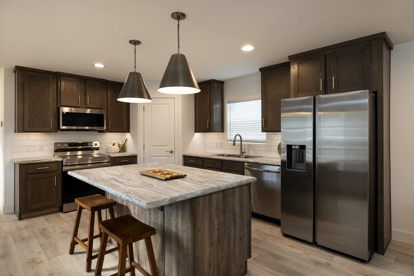 The RAMSEY 217-1 Kitchen. This Manufactured Mobile Home features 3 bedrooms and 2 baths.