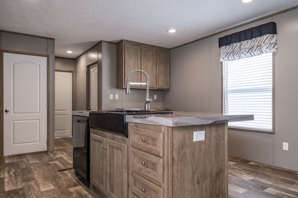 The PEYTON Exterior. This Manufactured Mobile Home features 3 bedrooms and 2 baths.