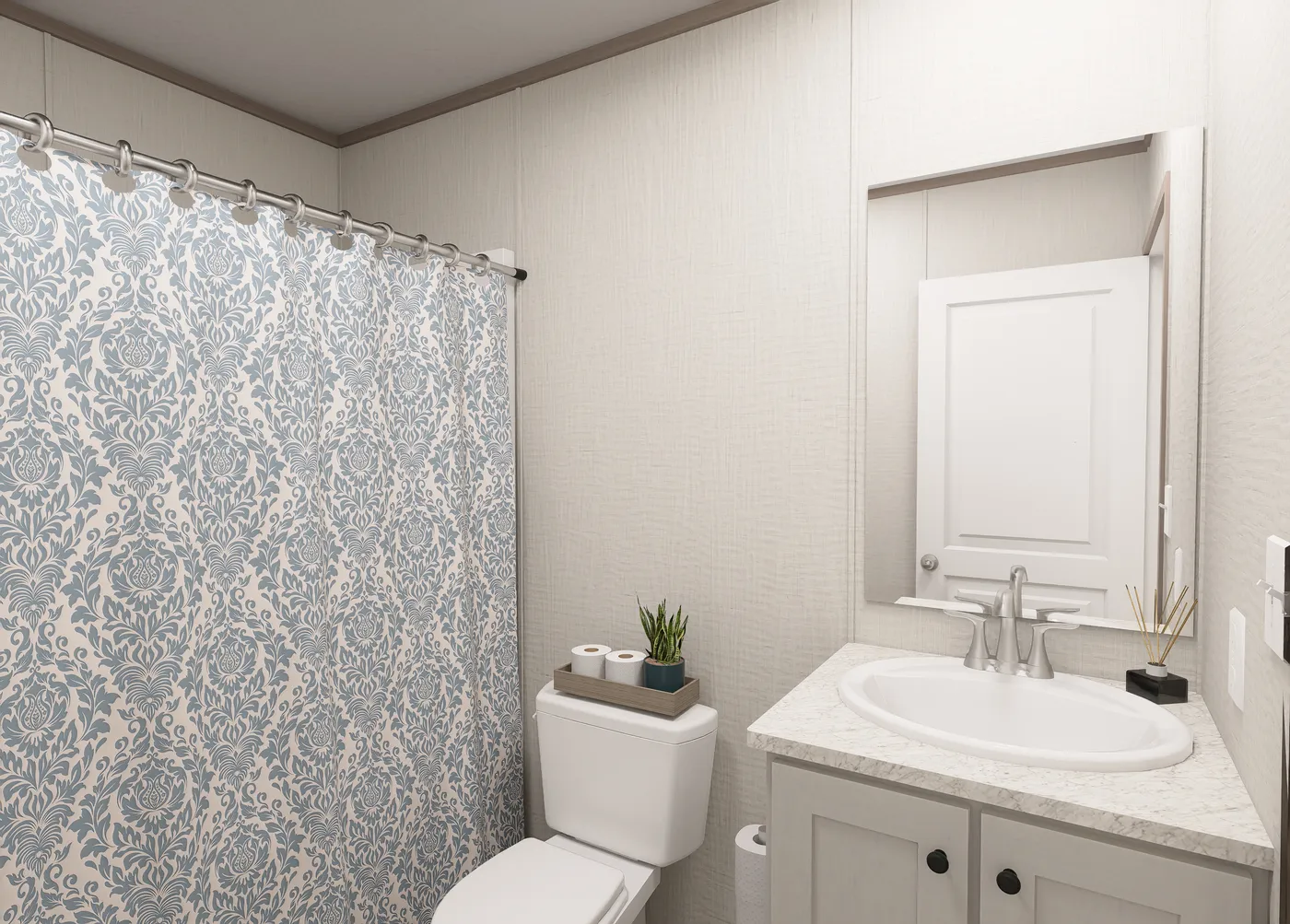 The FLEX COASTAL BREEZE Guest Bathroom. This Manufactured Mobile Home features 3 bedrooms and 2 baths.