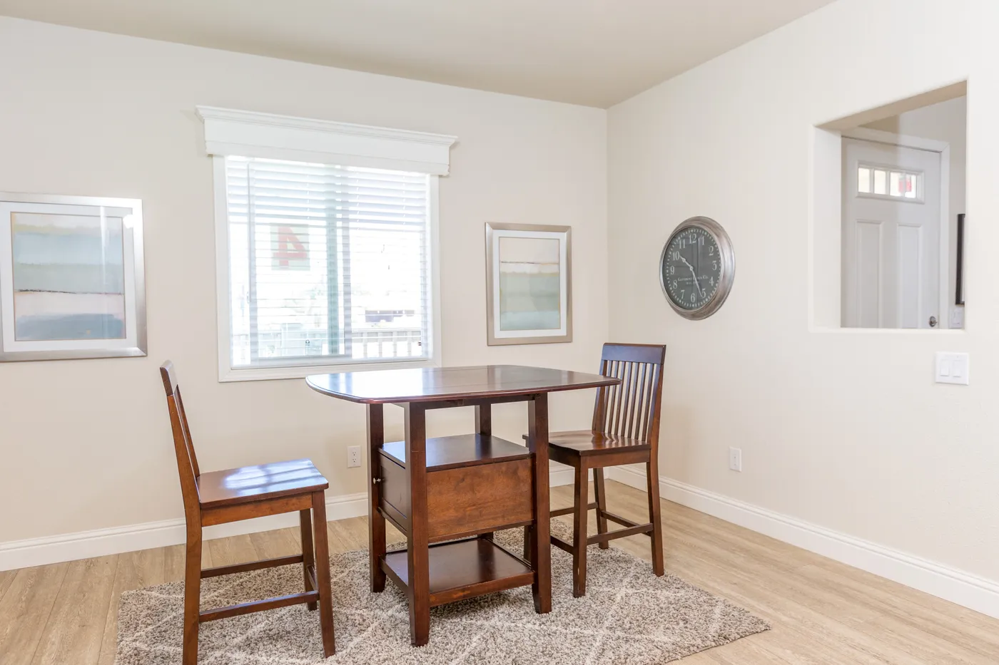 The FAIRPOINT 27543F Dining Room. This Manufactured Mobile Home features 3 bedrooms and 2 baths.