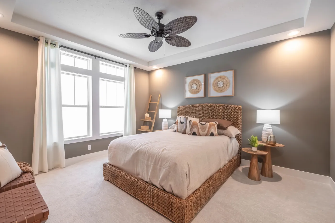 The UTOPIA 5230-MS050 SECT Primary Bedroom. This Manufactured Mobile Home features 3 bedrooms and 2 baths.