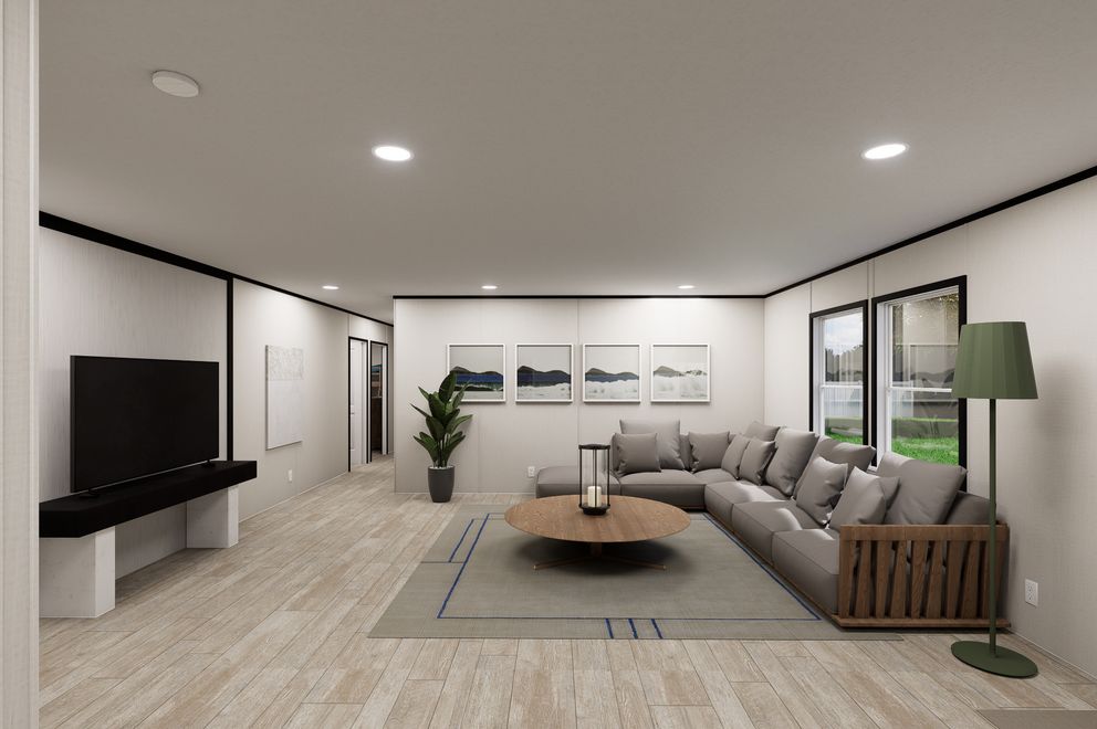 The ULTRA FLEX JEWEL GRANDE Living Room. This Manufactured Mobile Home features 4 bedrooms and 2 baths.