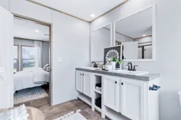 The THE RENEGADE Primary Bathroom. This Manufactured Mobile Home features 3 bedrooms and 2 baths.