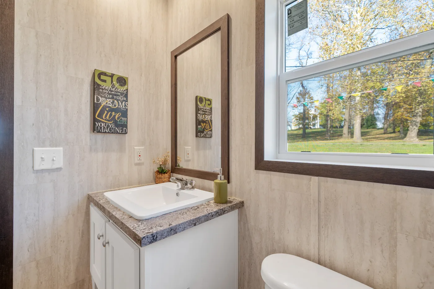 The GARNET Primary Bathroom. This Manufactured Mobile Home features 3 bedrooms and 2 baths.