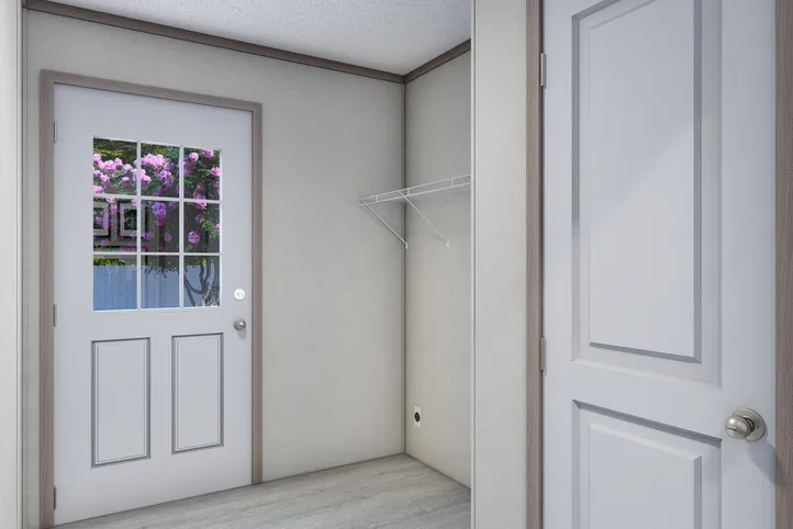 The 5228-E774P THE PULSE Utility Room. This Manufactured Mobile Home features 3 bedrooms and 2 baths.