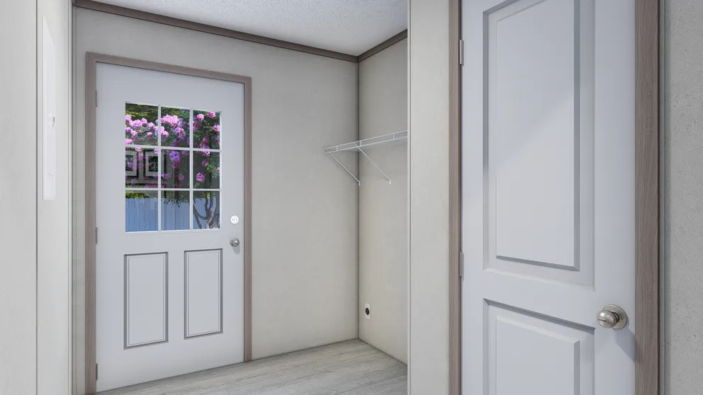 The 5228-E774P THE PULSE Utility Room. This Manufactured Mobile Home features 3 bedrooms and 2 baths.
