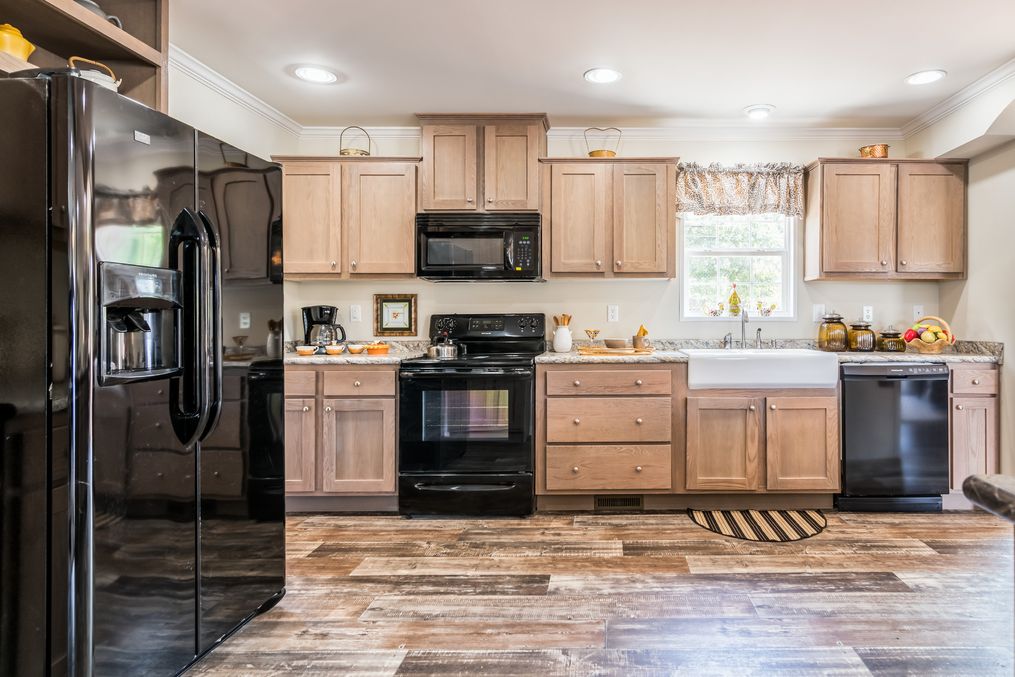 The KENNESAW ELITE Kitchen. This Manufactured Mobile Home features 4 bedrooms and 2 baths.