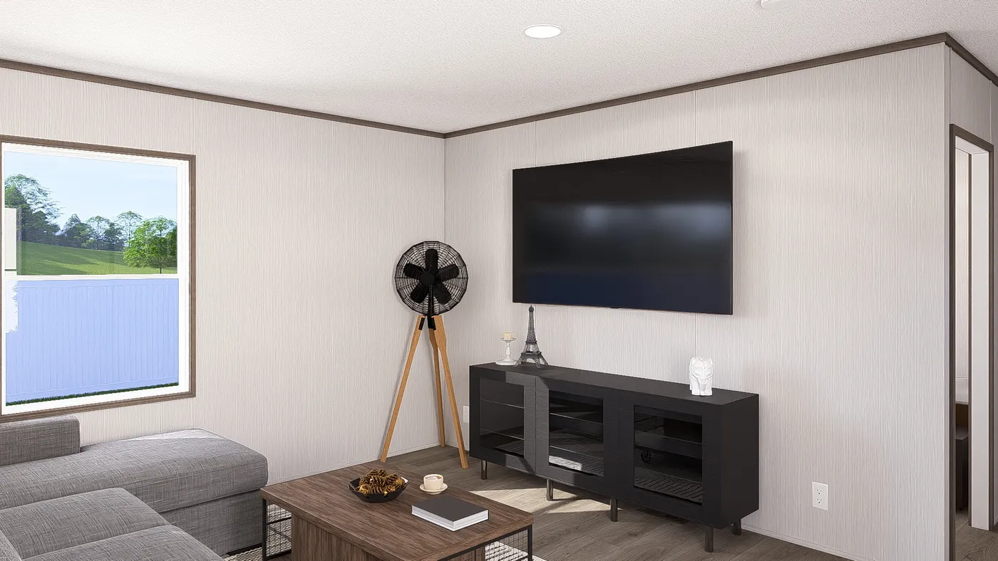 The LEGEND ANNIVERSARY 16X76 Living Room. This Manufactured Mobile Home features 3 bedrooms and 2 baths.